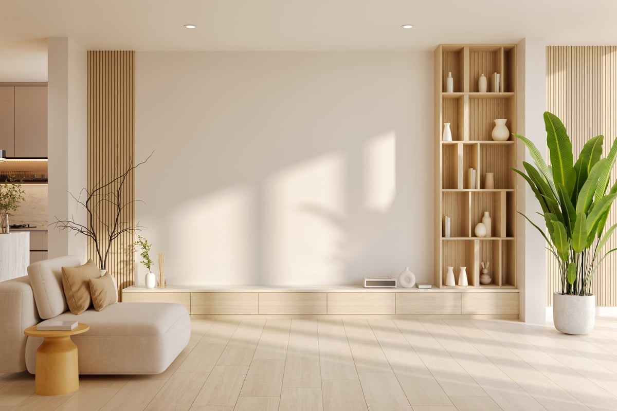 Interior of a modern living room with a stylish wooden sofa and wood shelf. Minimalist design with a large empty tv wall for mockup.3drender